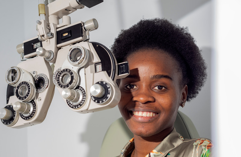 African young woman girl doing eye test.